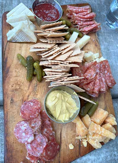 Meat and Cheese's popular charcuterie board, one of our favorites on the menu. A plain ramen noodle soup kids entree for the girls.