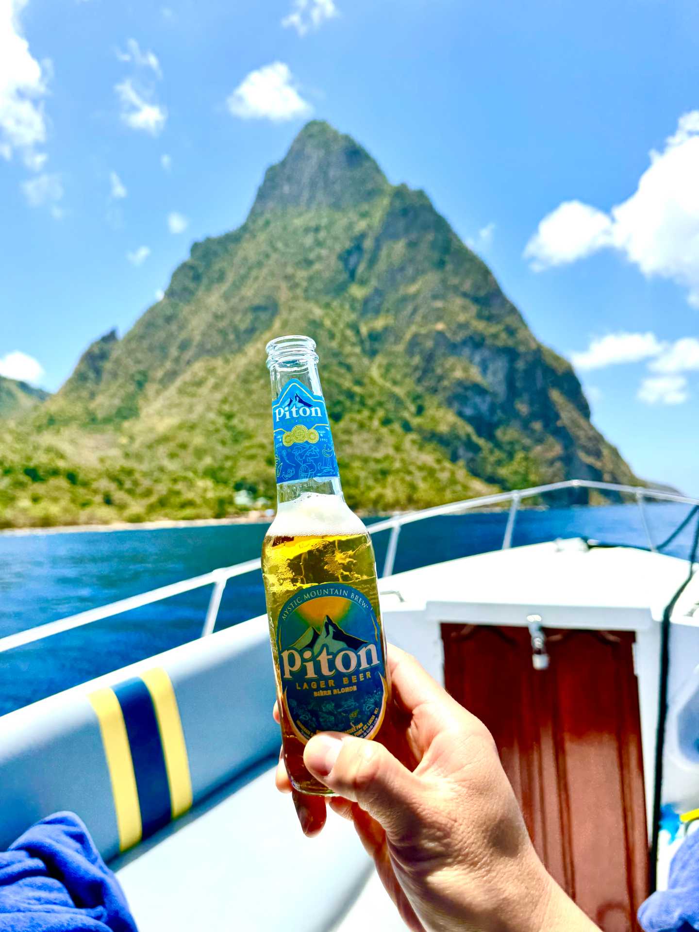 Cheers to the best family excursions in St. Lucia! There was no shortage of Pitons, sun, tan lines, smiles and St. Lucia views. Windjammer Landing views from the ocean on our way back from our family day trip were so beautiful with its’ hilltop accommodations-1