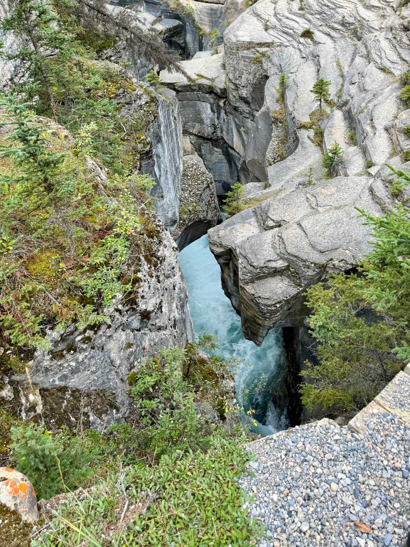 While Mistaya Canyon offers stunning views, it’s important to be cautious near the edge. There are no guardrails, and the rocks can be slippery, especially near the roaring water. Keep children and pets close, and stay alert, as it’s easy to lose footing near the canyon’s steep drop-offs-3