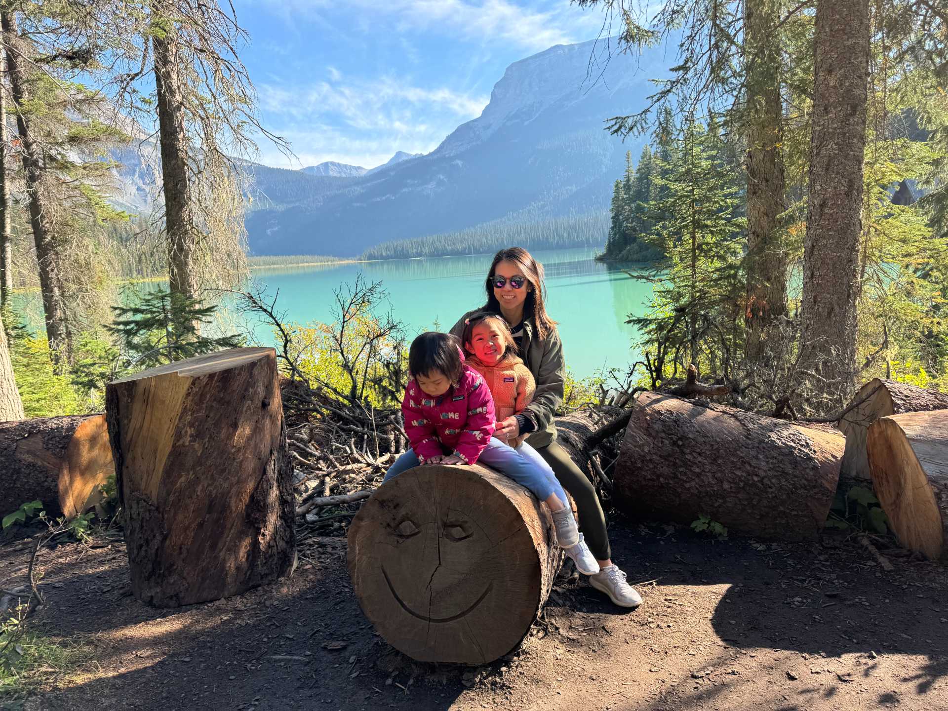 Emerald Lake's vibrant colors are best seen from the shoreline. The far side of Emerald Lake provides a quieter, more secluded experience. While the initial part of the trail is forested, the views open up and offer a perfect spot for nature lovers seeking solitude-1