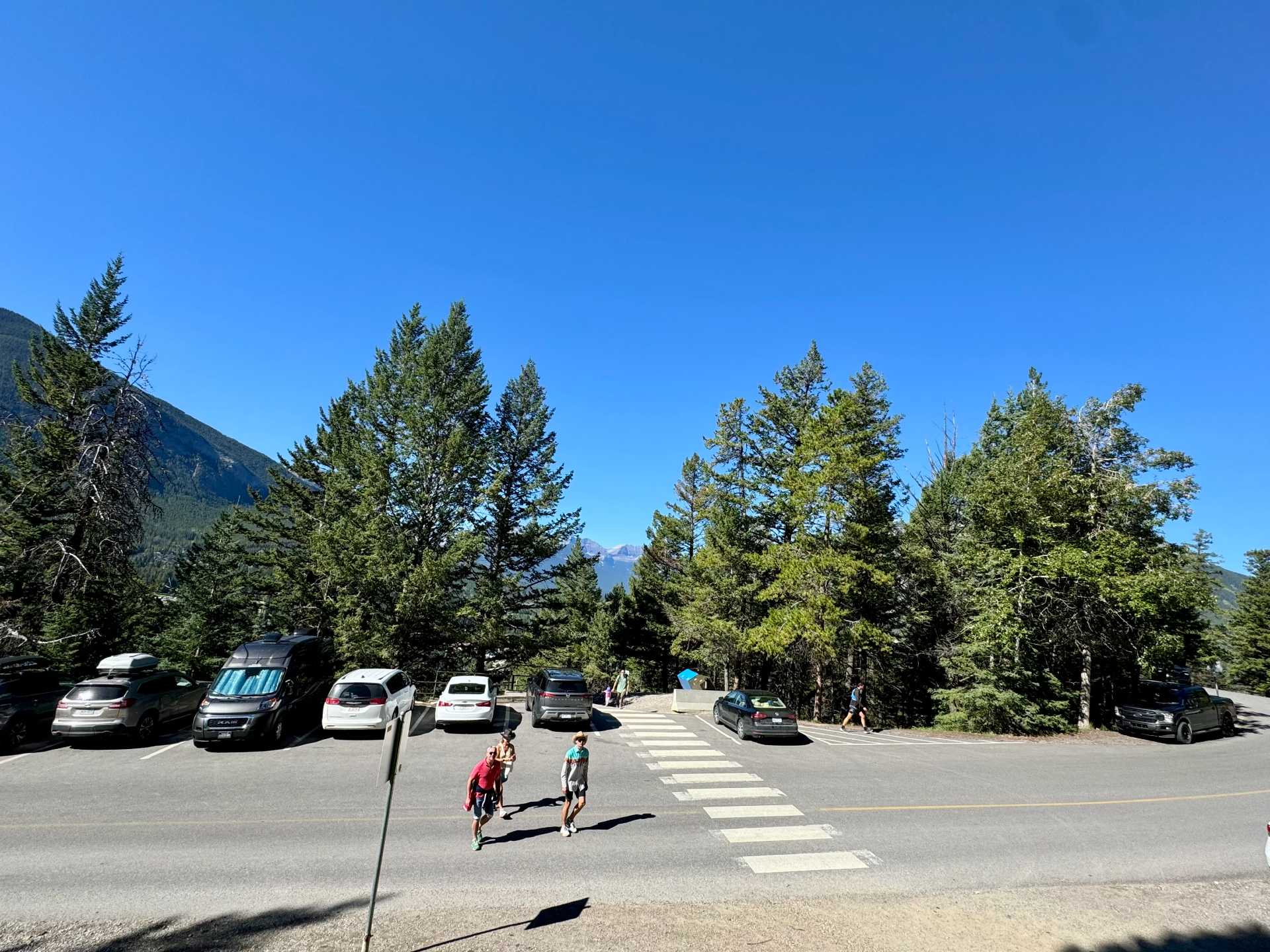 Once you get through the first small section of the Tunnel Mountain hike, you will cross a small street to continue onto the rest of the hike, which is also where the upper parking lot is located. From there you can already see some views of the city-2