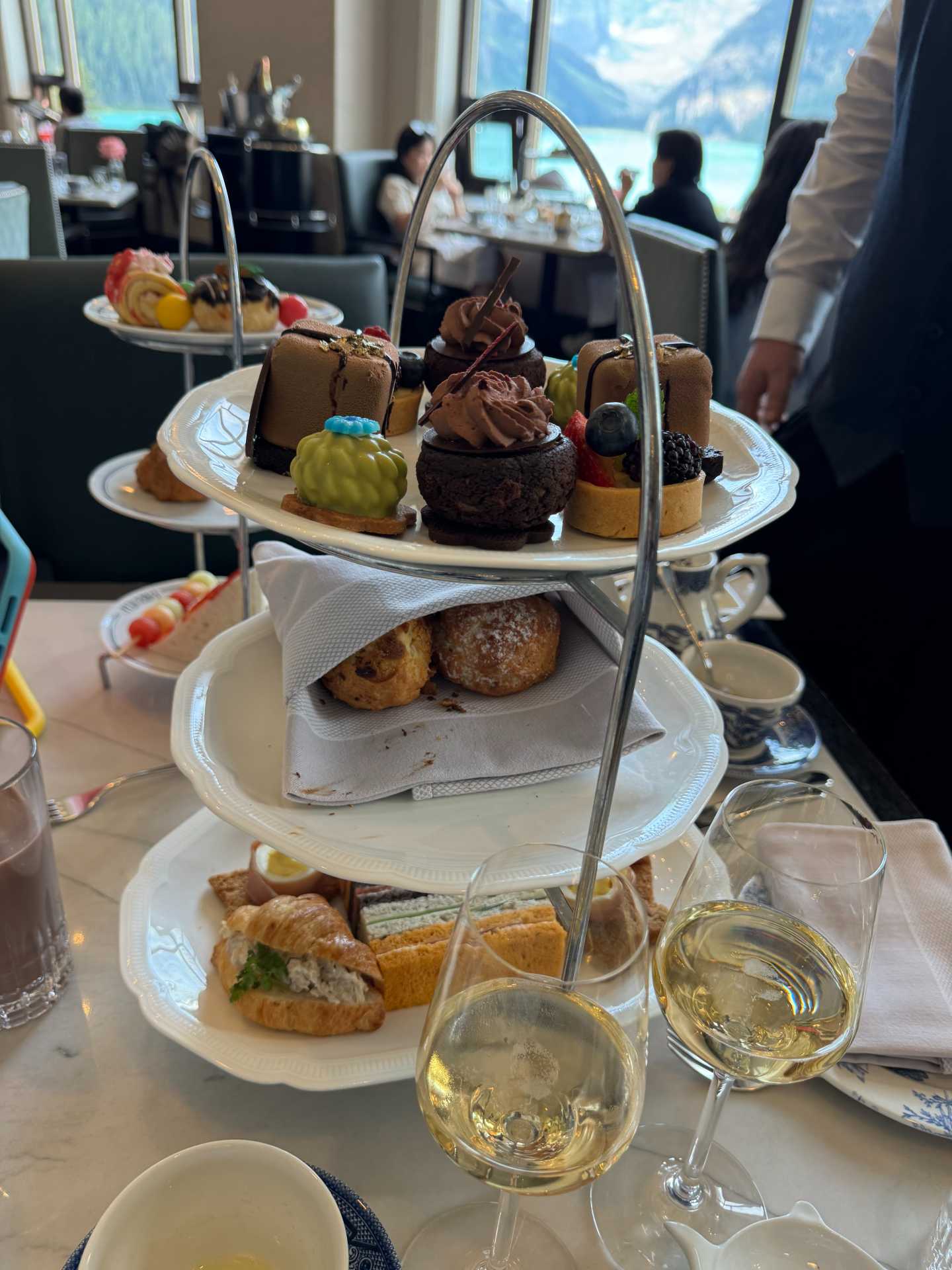 From the first sip of sparkling wine to the last bite of dessert, afternoon tea at Fairmont Chateau Lake Louise is pure luxury. A perfect treat for the whole family! The Kids’ Afternoon Tea at Fairview included chocolate milk and a fun selection of sandwiches and sweets-2