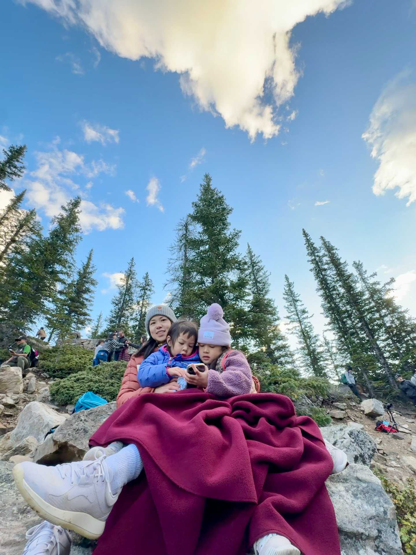 Early morning magic! Watching the first rays of sunlight light up Moraine Lake – an unforgettable sight. Pro tip: Arrive at least 30 minutes before sunrise to secure the best vantage point and capture the breathtaking colors as they change with the light-3