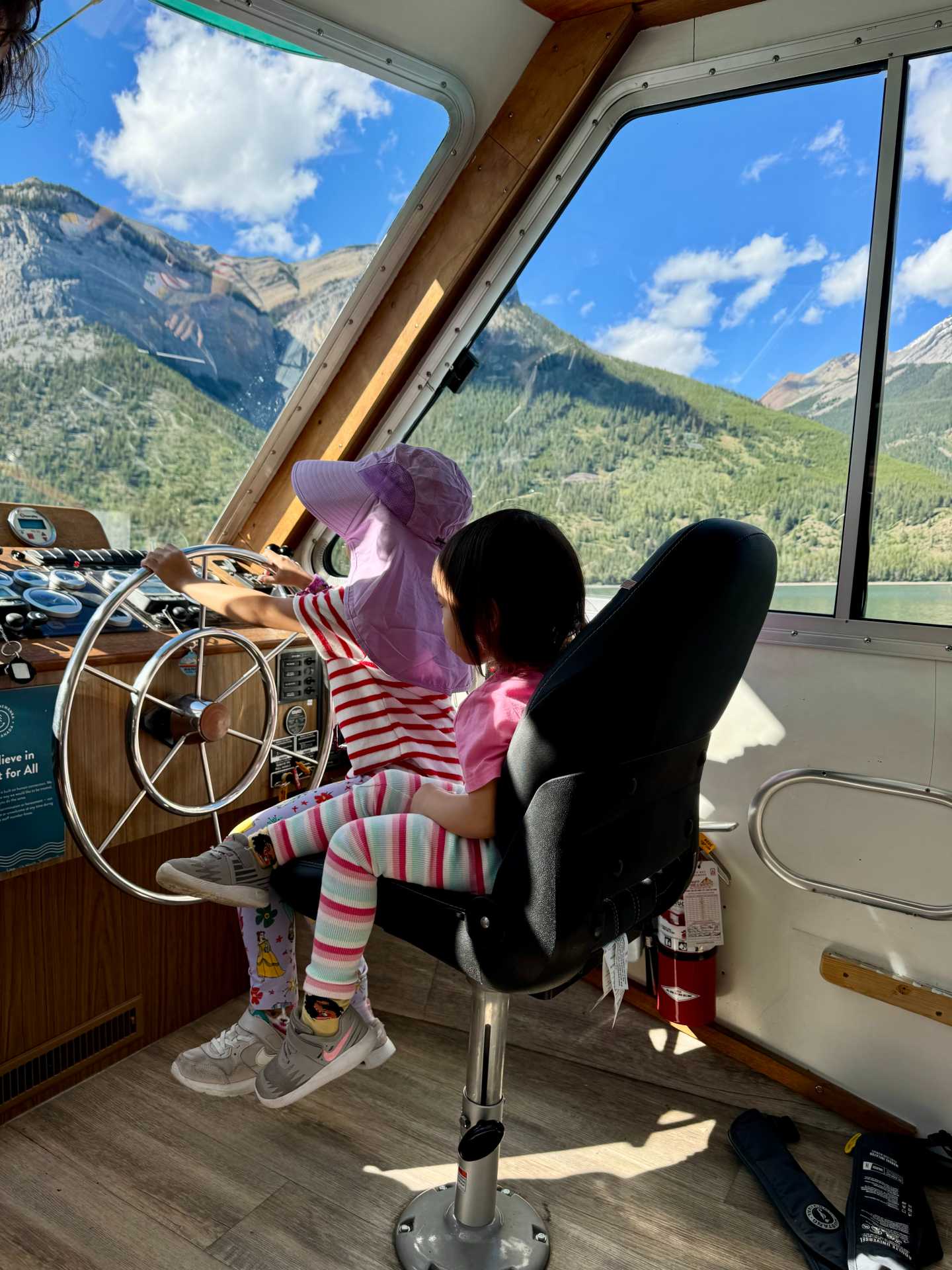 The staff on the Lake Minnewanka Jr. Explorer Cruise went above and beyond with the kids! They even got to steer the boat, and the fun storyline made the trip even more engaging. A truly memorable adventure for young explorers-2