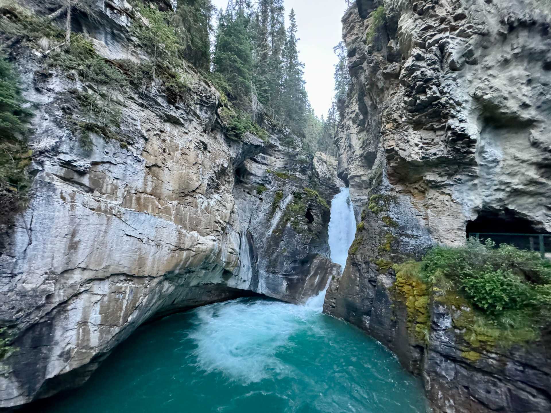 View of the Lower Falls waterfall from the bridge and through the cave-1