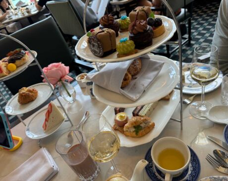 The stunning presentation of our afternoon tea spread, complete with delicate sandwiches, fresh scones, and mouth-watering desserts.