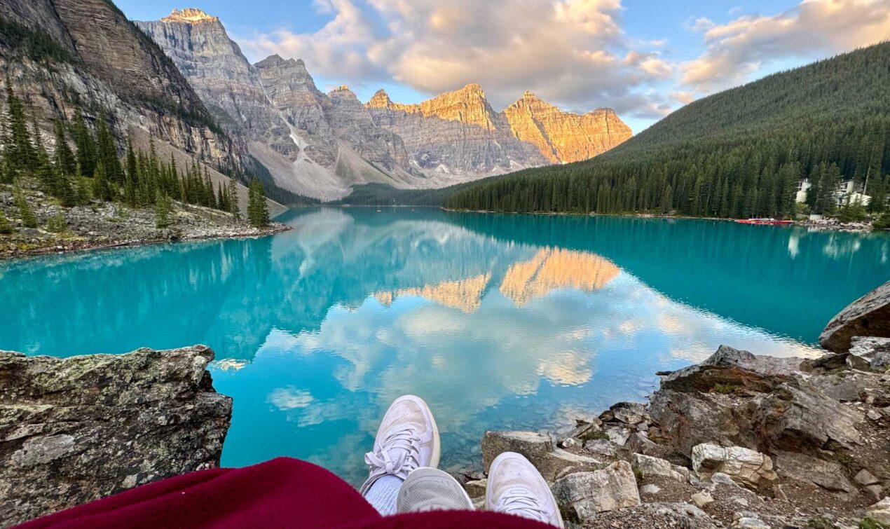 A morning we’ll never forget – the beauty of Moraine Lake bathed in golden light. Bonus tip: If you're up for a short walk after the sunrise, take the Lakeshore Trail for quieter views and more incredible photo opportunities.