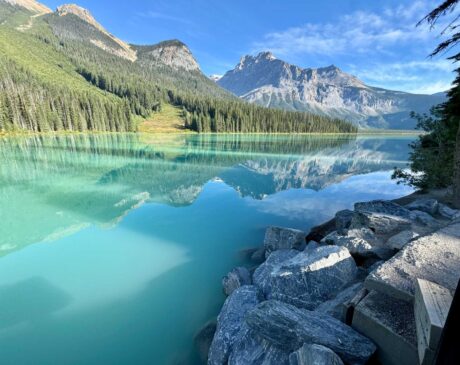 Emerald Lake's stunning green waters in the morning light. Tip: Arrive before 9 a.m. to secure a parking spot and enjoy the tranquil beauty of the lake before the crowds arrive.