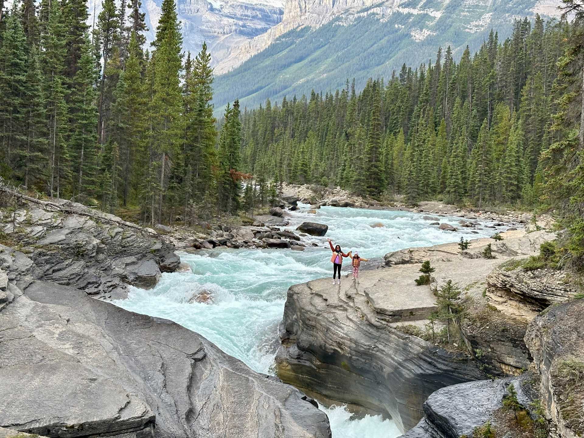 Exploring Mistaya Canyon, a hidden gem along the Icefields Parkway. This short, family-friendly trail takes only 10-15 minutes to reach the canyon, offering incredible views and a peaceful atmosphere away from the crowds. Perfect for families or those seeking a quick nature escape.