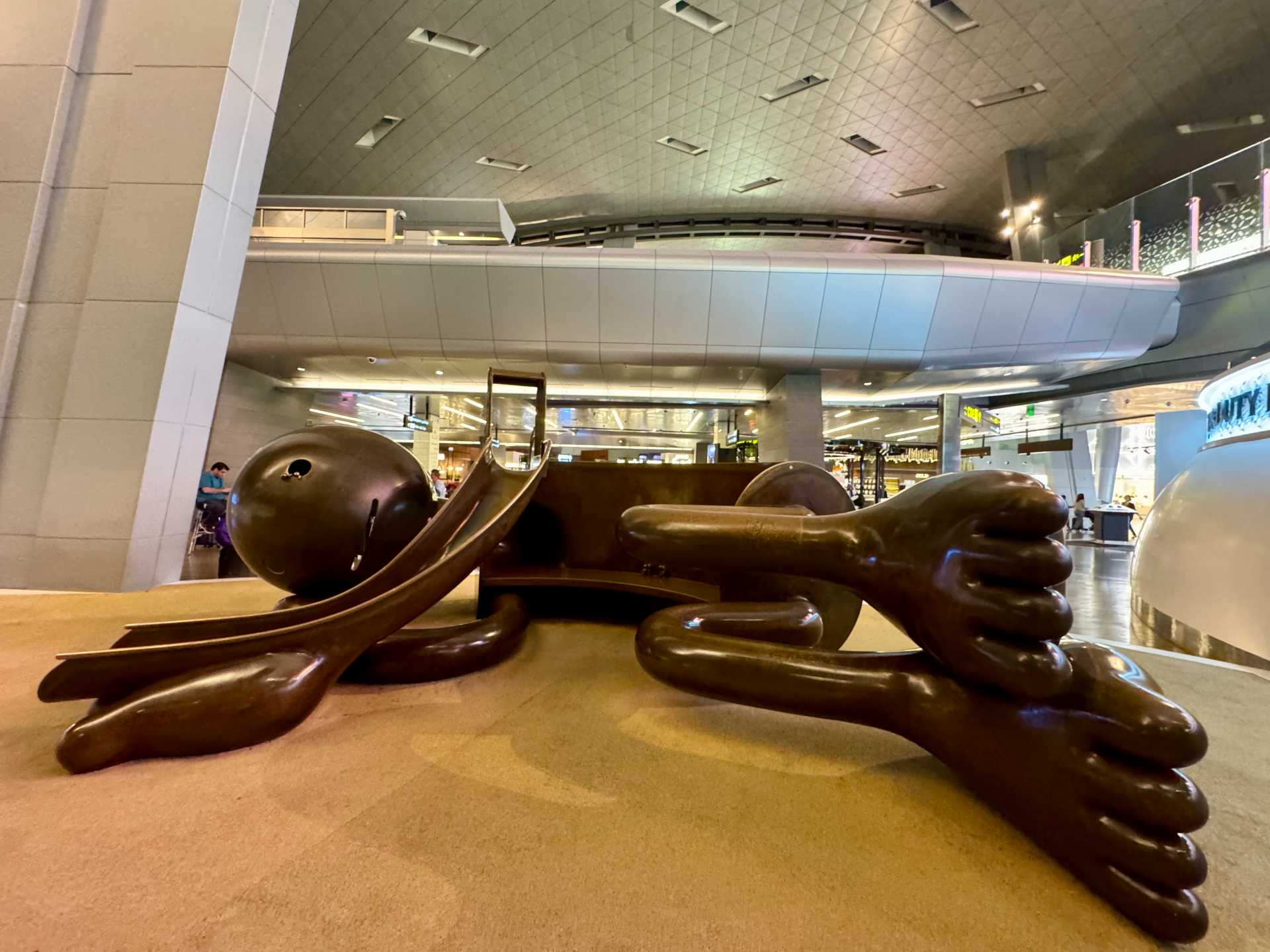 If you’re traveling through Doha’s Hamad International Airport with kids, the indoor playgrounds near Terminals A, B, and C are a must-visit. These creative play structures let kids run, climb, and slide—perfect for burning off energy after a long-haul flight. Free, screen-free entertainment right inside the airport-2