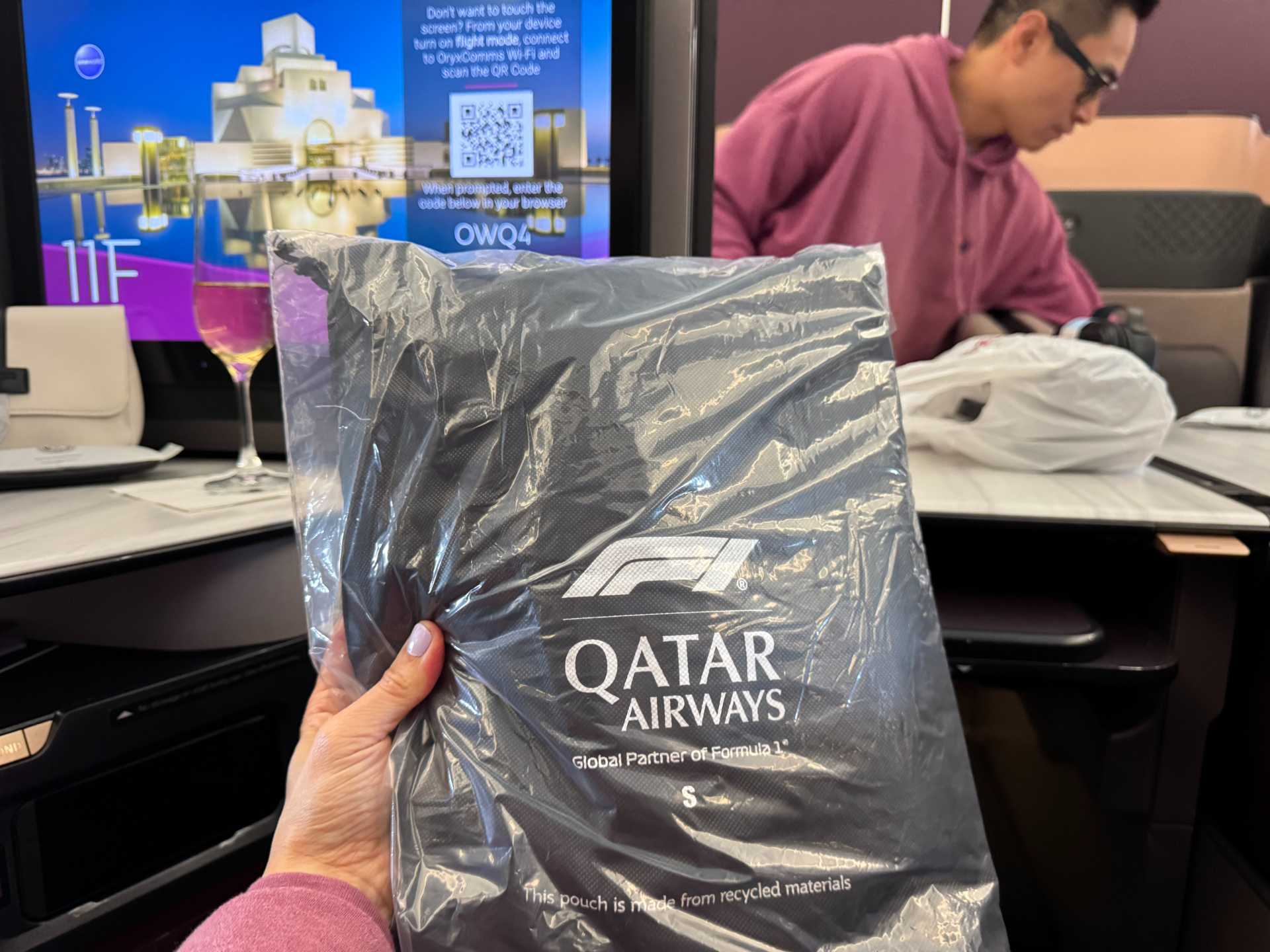 Qatar Airways Business Class came through with comfy unisex pajamas (yes, shirt and pants!) and a Diptyque amenity kit that made me feel slightly human again. Not quite a spa day—but for 35,000 feet? I’ll take it-2