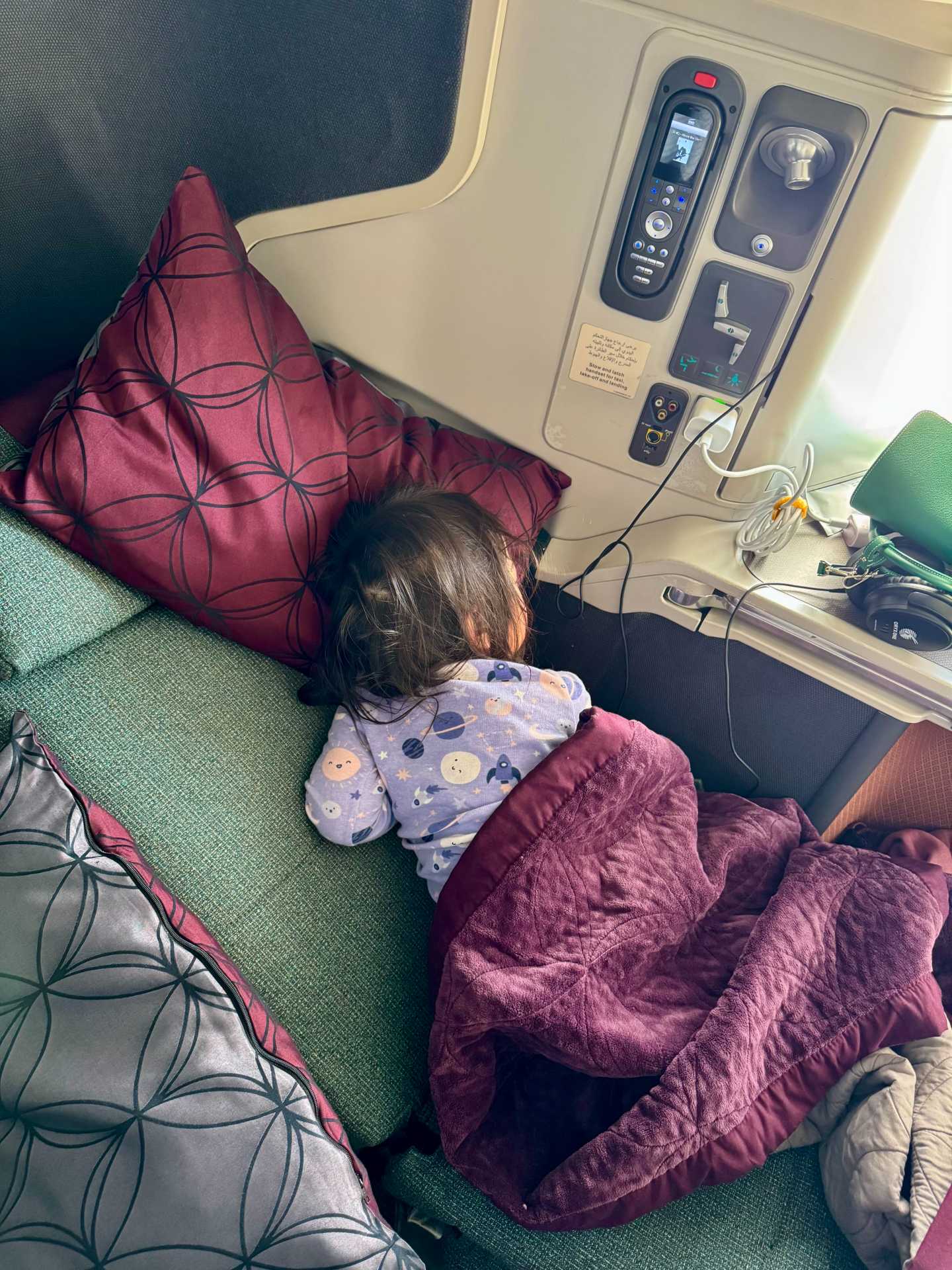 Our Qatar Airways Business Class flight from Doha to Malé featured a 1-2-1 seat configuration, offering great privacy—but not ideal when flying with young kids. Since we booked the Business Light fare, we couldn’t select seats until check-in opened 24 hours before the flight-3