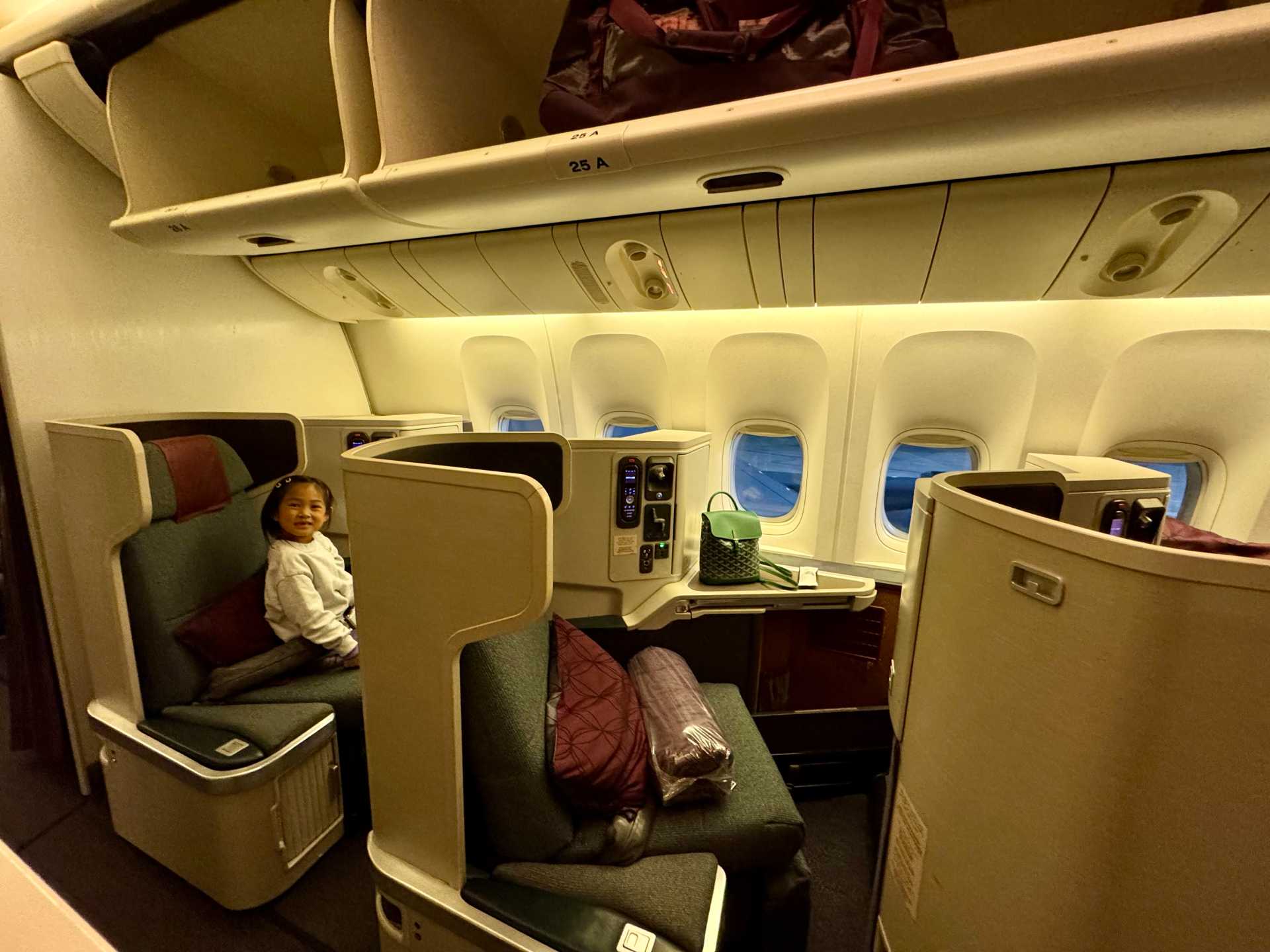 We ended up with four window seats in a back-to-back layout, which made it a bit more challenging to keep an eye on our toddler mid-flight. If you're flying as a family and want to sit together, this is definitely something to keep in mind.
