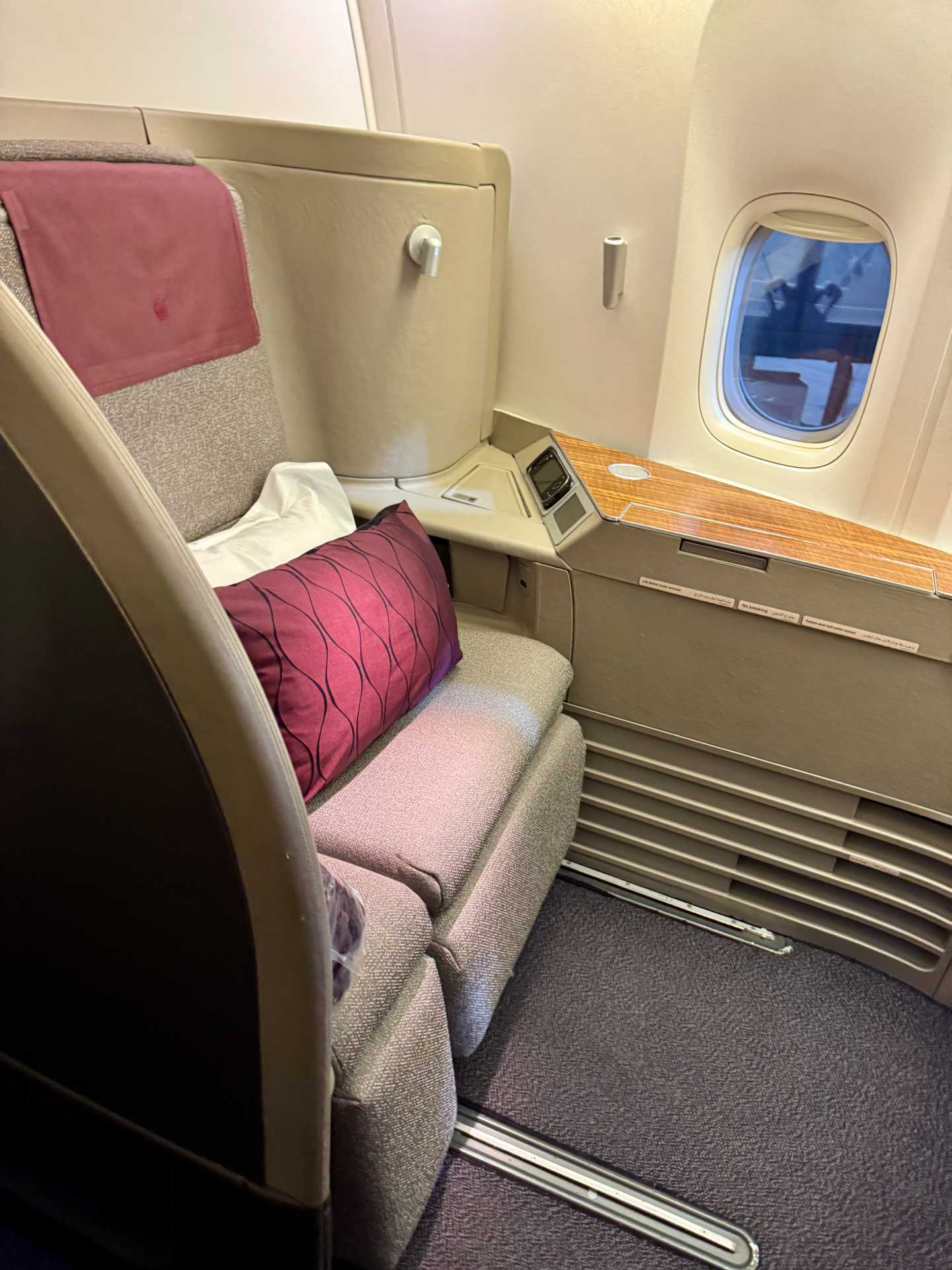 Our Qatar Airways Business Class flight from Doha to Malé featured a 1-2-1 seat configuration, offering great privacy—but not ideal when flying with young kids. Since we booked the Business Light fare, we couldn’t select seats until check-in opened 24 hours before the flight-1