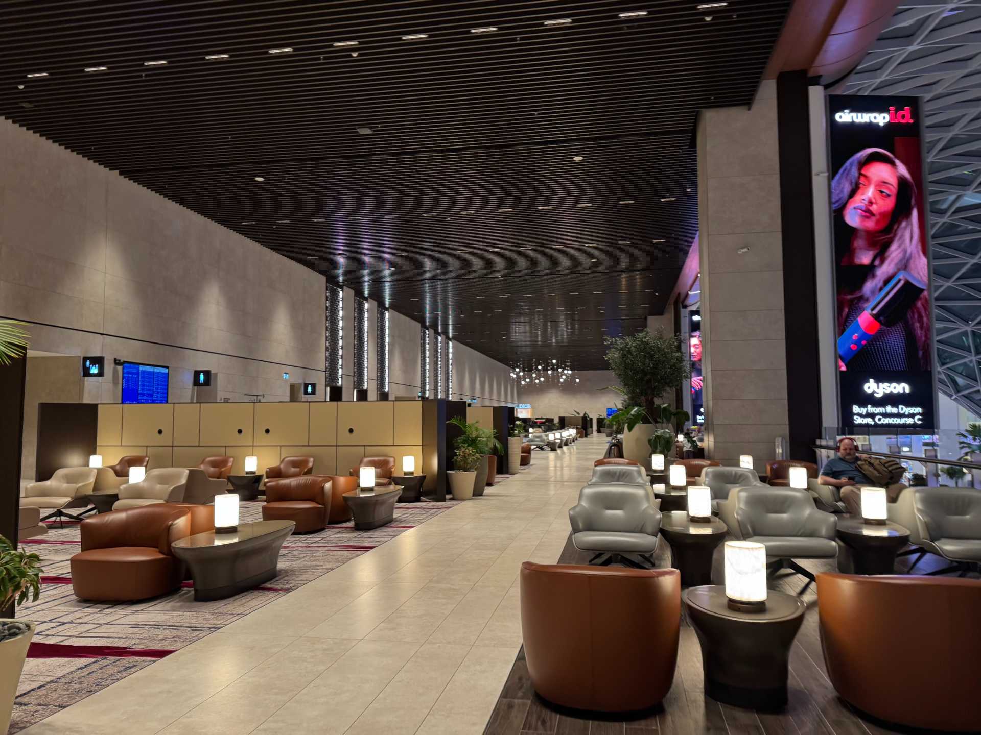 The Al Mourjan Garden Business Lounge at Doha’s Hamad International Airport was a standout during our layover. The lounge is incredibly spacious, with plenty of seating, a variety of food options—including made-to-order sushi and light snacks—and a calm atmosphere to unwind. One bonus we didn’t expect: a game room with pool tables, which was a fun way to pass the time between flights. It was the perfect place to relax and recharge as a family-1