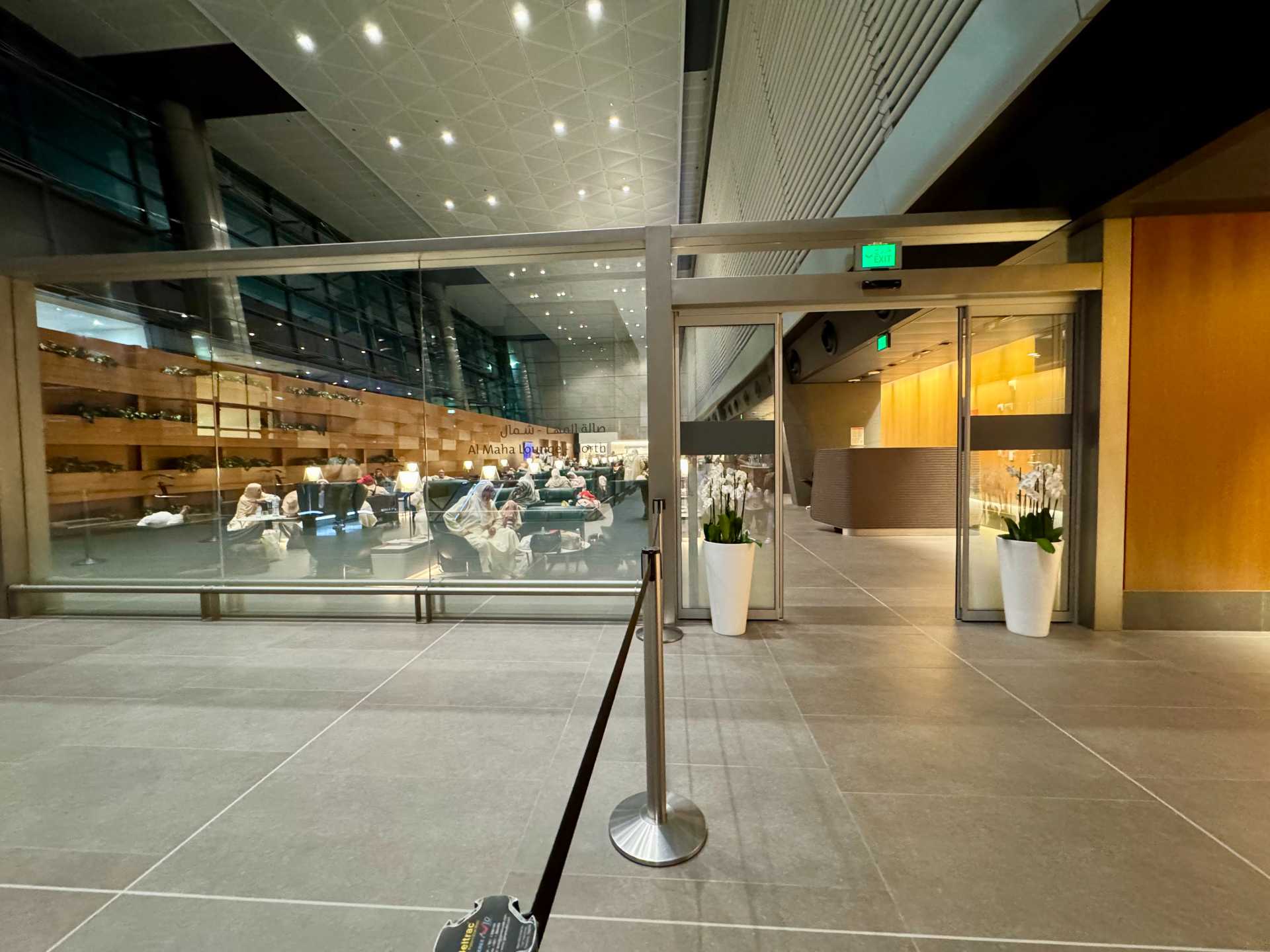 The Al Maha Lounge at Hamad International Airport's main terminal can be easily found by looking for this escalator. The kids were happy with its’ simple food options like pasta and chicken. The Al Maha Lounge serving Gates D and E offered a quieter space with plenty of seating. If you’re traveling with kids and looking for a low-key, family-friendly lounge, Al Maha is a solid option-3