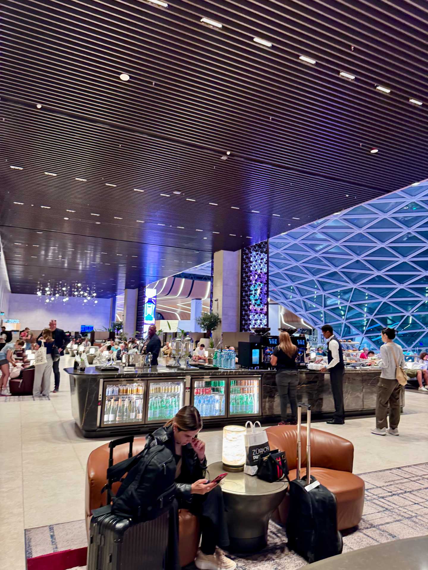 These before-and-after photos of the Al Mourjan Garden Lounge at Doha’s Hamad International Airport show just how much the space can fill up. While it was peaceful and nearly empty when we arrived in the early evening, the lounge became much busier late at night. With so many international flights transiting through Doha, peak hours at the lounge can get crowded quickly—something to keep in mind if you're planning to rest or dine during your layover-4
