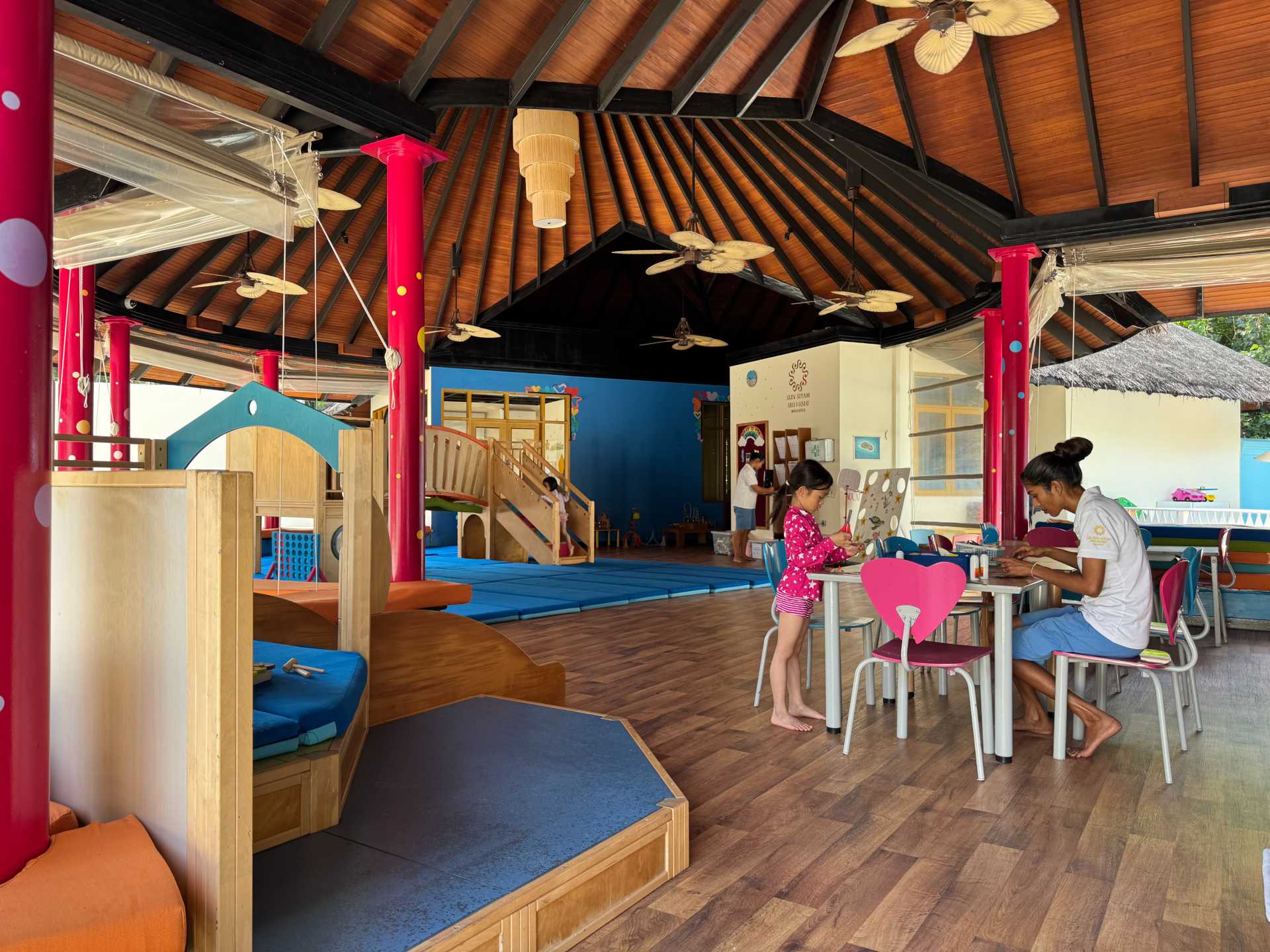The kids club at Sun Siyam Iru Fushi offered a full schedule of daily activities—and our girls were always excited to join in. Just note: the space is mostly outdoors, so be prepared to scoop up some very warm (but very happy) kids by pickup time-2