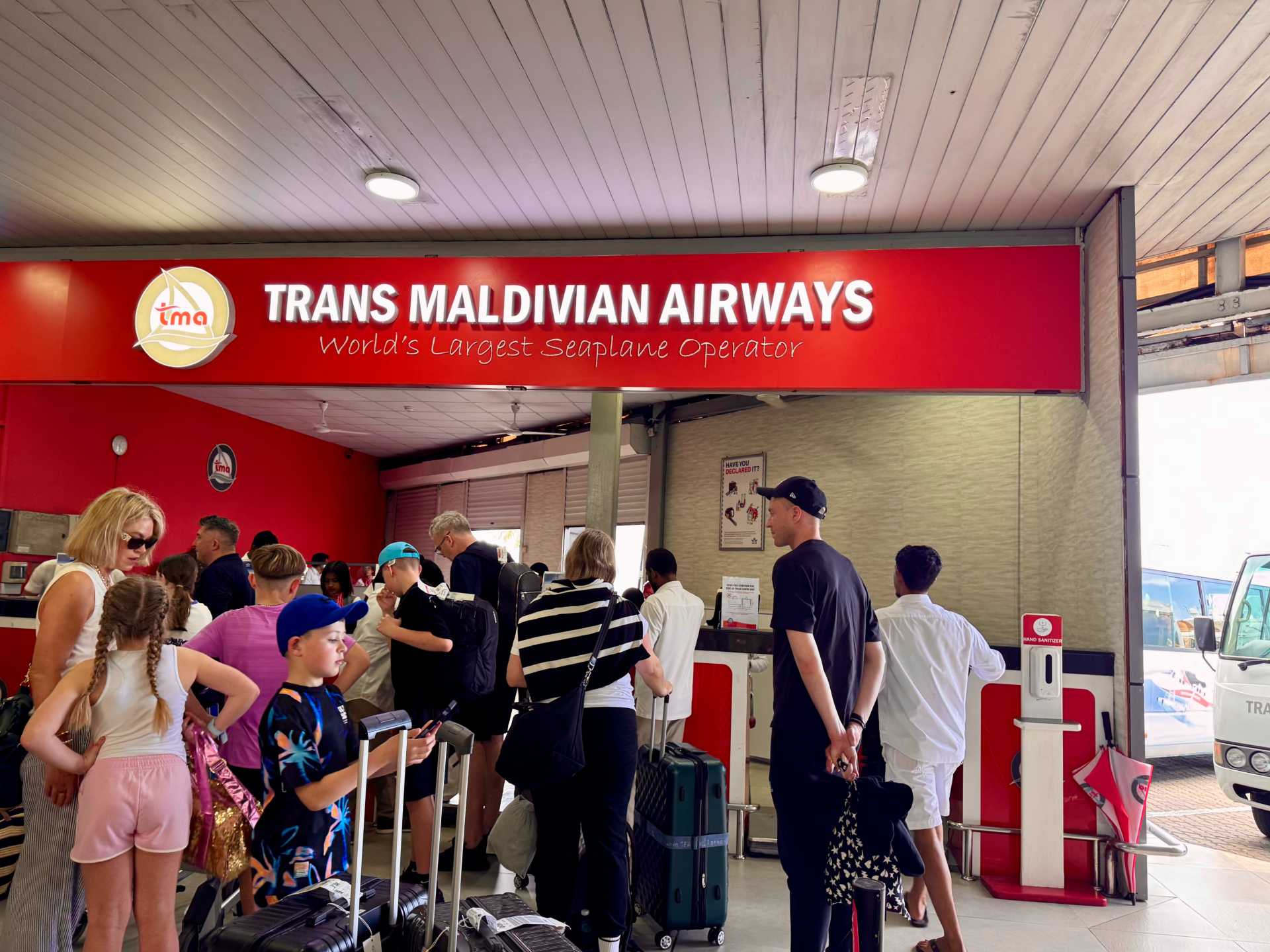 Upon arriving in Malé, the scene was a bit chaotic with dozens of resort representatives holding signs. We didn’t spot ours right away, so I doubled back and eventually found the Sun Siyam Iru Fushi rep. From there, we were guided to the Trans Maldivian Airways desk to get our luggage tagged and board the shuttle to the seaplane terminal.