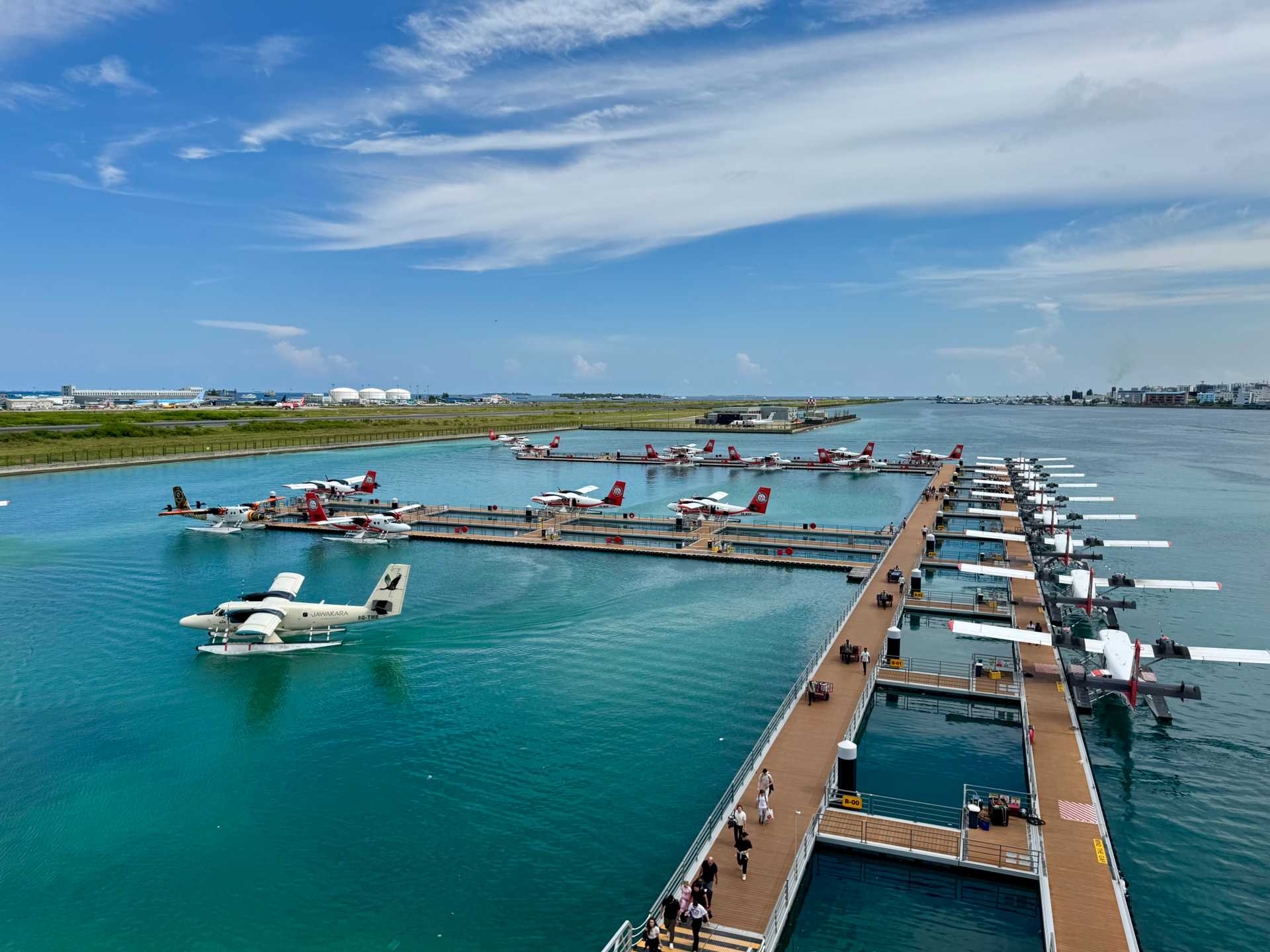 Upon arriving at the Noovilu Seaplane Terminal, we were escorted to the third floor where Sun Siyam Iru Fushi’s private lounge is located. It was a quiet, comfortable space to rest and recharge while we waited for our seaplane. Bonus: the lounge offers a beautiful view of the docked seaplanes below—a fun and fascinating sight for all-2